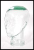 A vintage retro 20th century advertising shop display glass phrenology type head of clear glass
