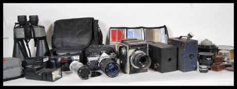 A small collection of 20th Century cameras and camera lenses to include, Corfield 66 having Lumax