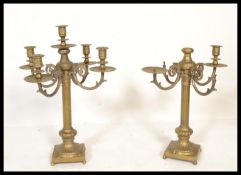 A very large and impressive early 20th Century tall brass candelabra multi branch candlestick raised