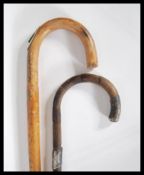 Two 20th Century walking sticks, one also being a horse measure having concealed extending alloy
