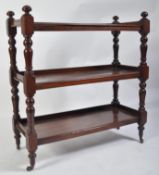 A Victorian 19th century mahogany 3 tier buffet sideboard. Raised on turned legs united by gallery