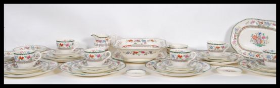 A 20th century Spode ceramic dinner service in the ' Indian  Tree ' pattern. Comprising dinner
