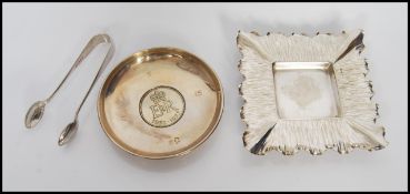 A 20th Century silver hallmarked dish, having central coin for the Queens silver Jubilee,