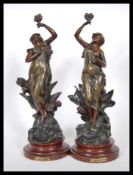 Charles Ruchot - A pair of 19th Century cast spelter Art Nouveau figurines entitled 'Les Iris'