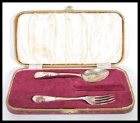 A mid 20th Century silver spoon and fork set within a vintage box. Makers marks for Viner's.