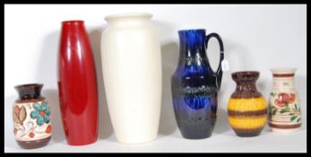 A collection of 20th Century studio pottery vases to include West Germany Fat Lava vase/ jug 407-35,