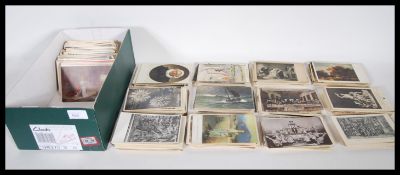 Subject postcards. Shoe-box with over 700 themed vintage non topographical postcards.