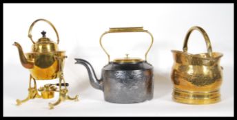A collection of 20th century brass items to include a brass spirit kettle on stand with burner, a