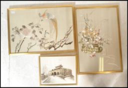 A group of three Chinese framed and glazed silk pictures, the pictures depicting court scenes