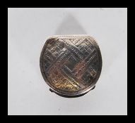 An early 19th Century Georgian silver hallmarked Vinaigrette scent box of horseshoe form having