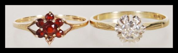 Two hallmarked 9ct gold cluster rings, one set with garnets size N the other with a single