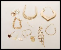 A selection of 9ct gold earrings to include a selection of singular jewellery pieces. Most