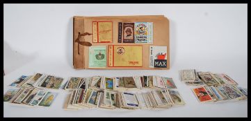 A collection of vintage 20th Century cigarette cards to include a selection of Chinese movie stars