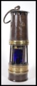An unusual 19th / early 20th century believed Ackroyd and Best Miners lamp. The lamp with an unusual