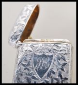 A group of three vintage and Victorian silver hallmarked vesta cases to include a Minshull and