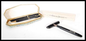 A small collection vintage 20th Century Conway Stewart lever fill fountain pens, one having a 14ct