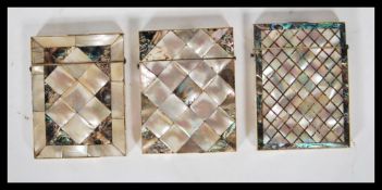 A group of three 19th Century Victorian mother of pearl and abalone ladies calling card cases,
