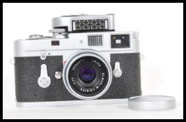 A Leica M2 Rangefinder chrome camera by Ernst Leitz GmbH Wetzlar Germany, serial number 1099984.