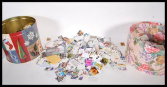 A collection of loose world stamps dating from the 20th Century, mostly British.