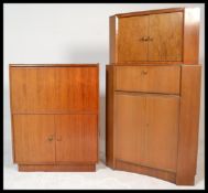 A retro 20th Century Teak wood bureau / desk corner cabinet together with a vintage cocktail cabinet