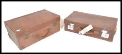 Two early 20th Century good quality pig skin / leather travel suitcases, both with clasps and