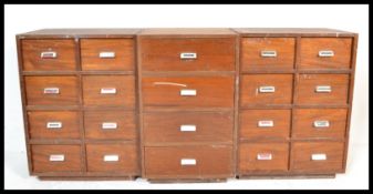 A set of three vintage mid 20th Century industrial factory drawer units, consisting of three banks