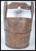 A 19th Century Chinese coopered wooden elm water pail / bucket being of cylindrical form with