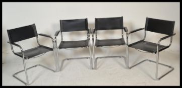 After Mart Stam - A vintage retro 20th Century dining suite to include a chrome and glass topped