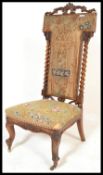 A Victorian 19th century mahogany Prie Duie / prayer chair with floral tapestry upholstered seat and