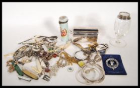 A small collection of silver and costume jewellery with other items to include silver rings, bangles