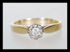 A hallmarked solitaire ring being illusion set with a single diamond. Hallmarked Sheffield. size