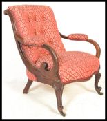 A 19th Century Victorian walnut slipper elbow chai