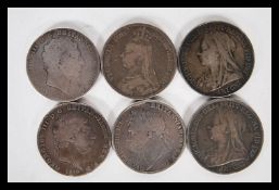 A collection of six silver crowns dating the early 19th Century to include three George II crowns
