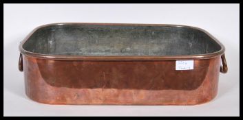 A 19th Century Victorian copper bain marie kitchen cooking tray having domed handles to either end.