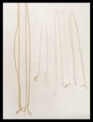 Three stamped 9ct gold fine necklace chains with spring ring clasps. Weight 4.2g. AF.