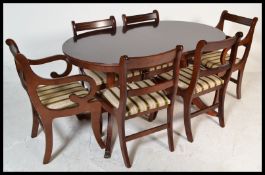 A 20th Century Georgian revival mahogany twin pede