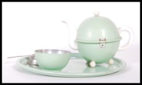 An early 20th Century circa 1930's miniature Heatmaster tea service for one. The service
