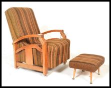 A vintage early 20th Century Art Deco Parker Knoll framed fireside armchair, shaped open open framed