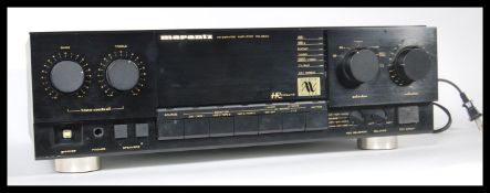 A 20th Century Marantz amplifier, having a black finish. Model No