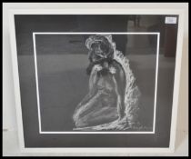 A 20th Century chalk pastel drawing depicting a reclined female nude depicted in white on black