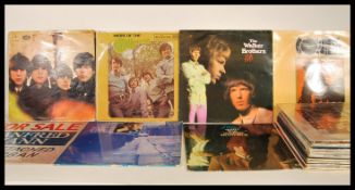 A collection of vinyl long play LP record albums to include Beatles For Sale and Love Songs, Chris
