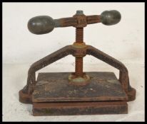 Book Binding Equipment - A heavy late 19th early 20th Century cast iron metal book press of