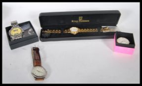 A collection of three gents wrist watches to include a retro Accurist sport yellow faced chronograph