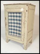 An early 20th century country house large painted white pine meat safe locker. The cupboard of large