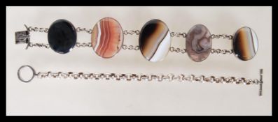 Two silver bracelets to include a stamped 925 belcher link bracelet with a toggle clasp along with a