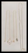 A group of 9ct gold necklaces to include a stamped 9ct gold chain necklace having a stamped 9ct