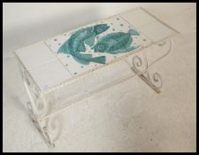 A vintage retro 20th Century wrought iron framed coffee /side / occasional table, the tile top