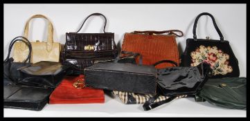 A collection of ladies handbags to include snakeskin examples, Jaeger, Liberty, Dunhill, Beadwork,