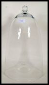 A  Victorian antique style  glass bell cloche / glass dome with a ball finial handle to the top.