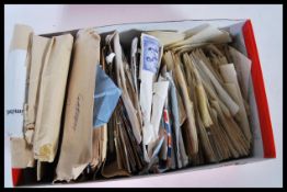 STAMPS a large collection / accumulation in packets of all world mostly older mint & used all in